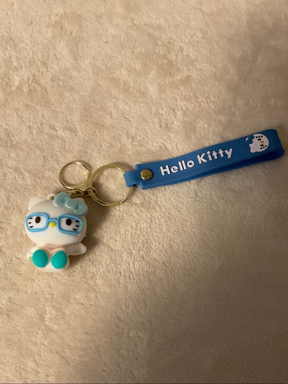 Hello Kitty Blue Silicone Strap Keychain with White Character Charm